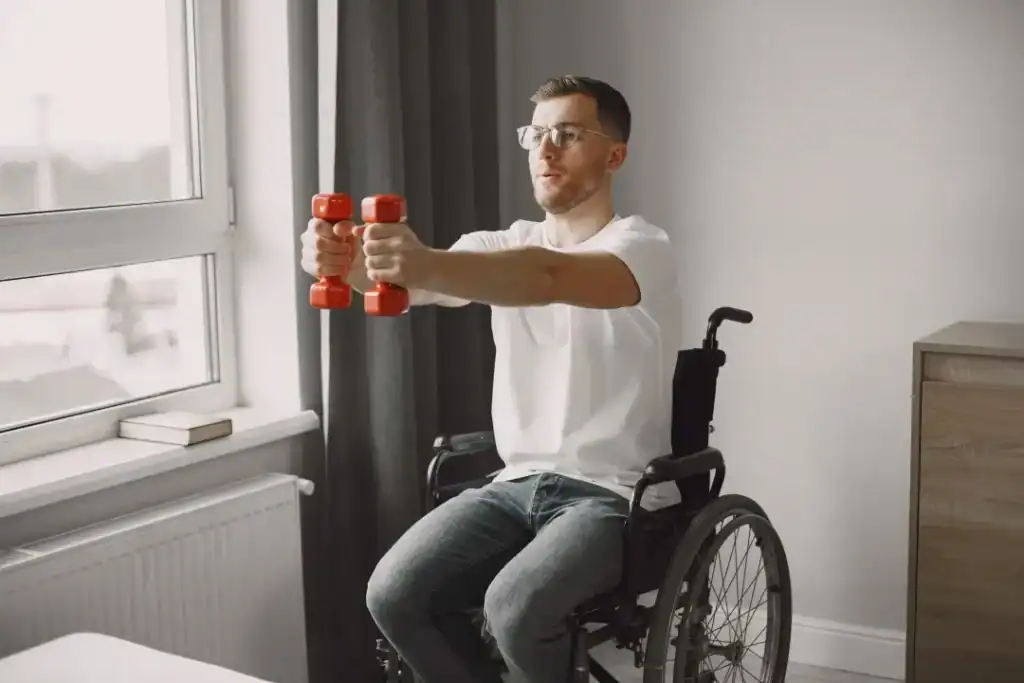 Image of man doing exercise in his wheelchair to aid weight loss Nantwich
