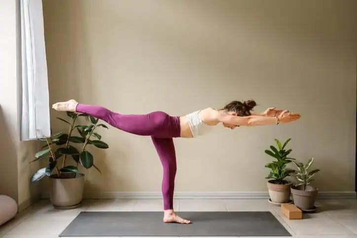 Achieving the Perfect Tone: How Often Should You Exercise for Results? 1 Woman doing Yoga exercise Nantwich to help with toning the body.